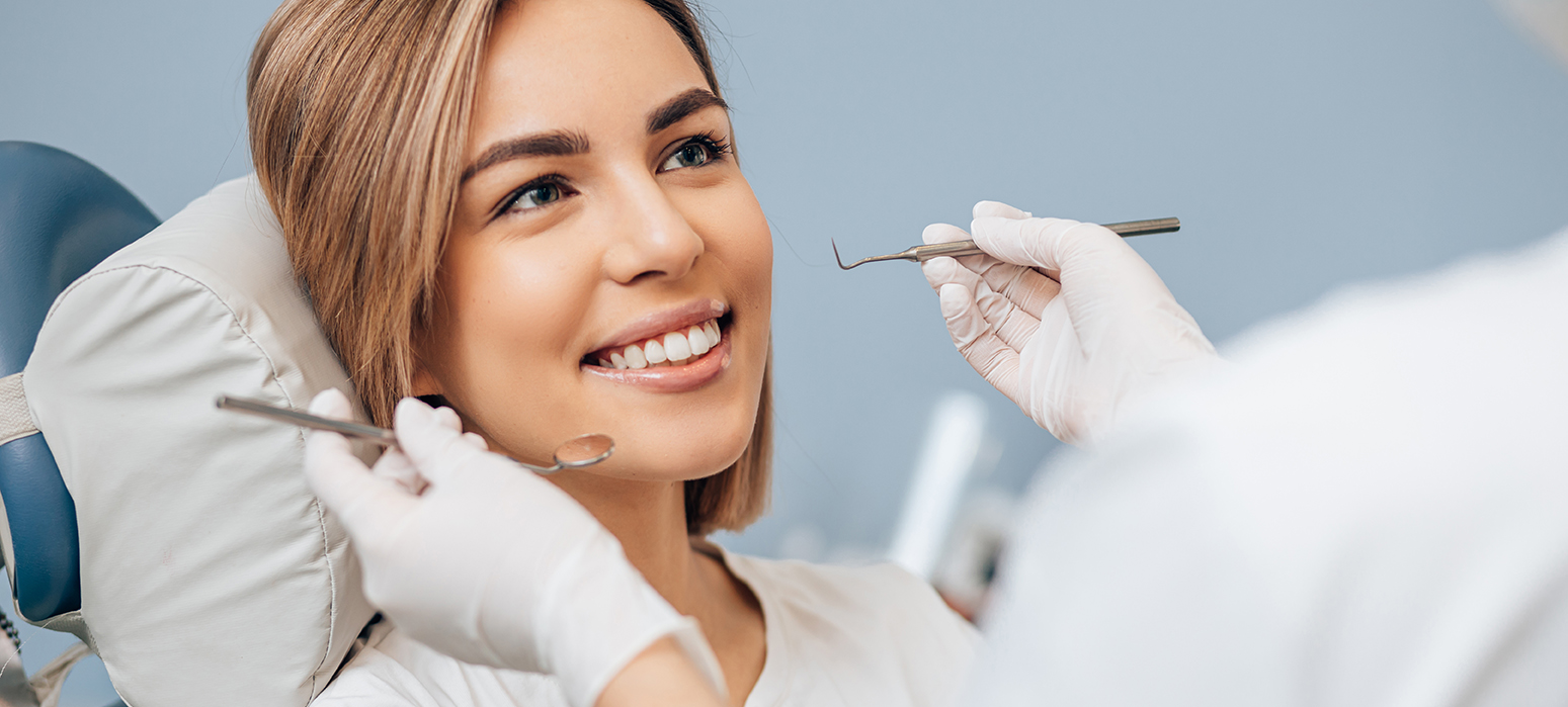 beautiful young woman in dental examination