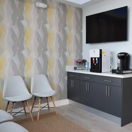 Comfortable seating area inside the dental office.